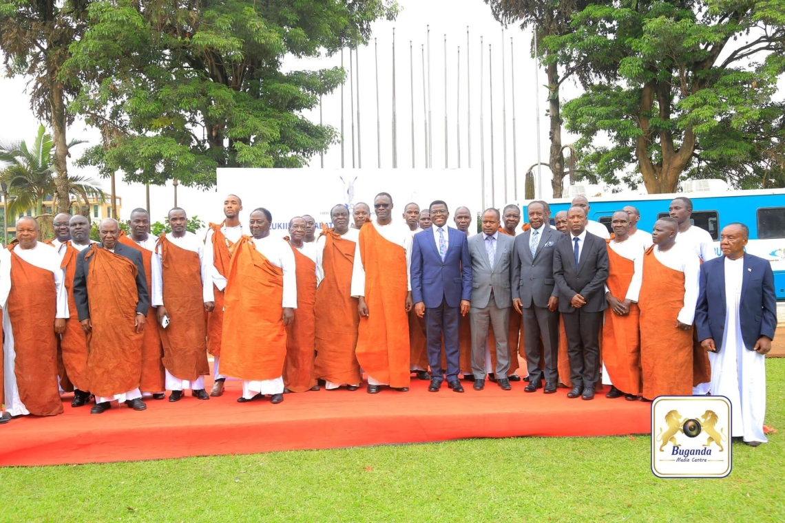 The Katikkiro poses for a group photo with senior clan heads after launching the event